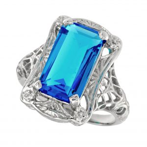 Synthetic Blue Topaz Filigree Solitaire Ring (R2787-26)